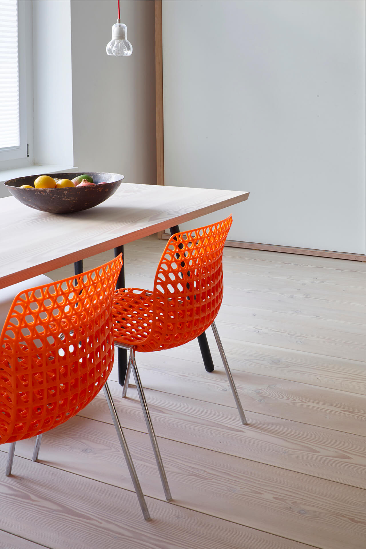 Detail of dining room with Douglas fir floorboard and table