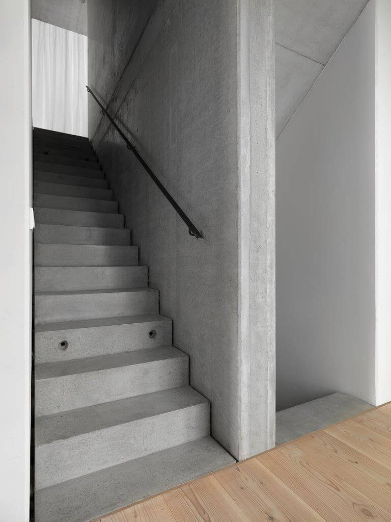 Douglas fir floorboards in 300mm width with a concrete staircase